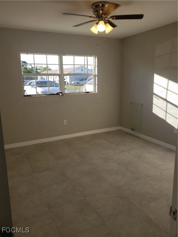 204 1st Street Fort Myers, FL 33907 - Photo 5 of 11 an empty room with a window