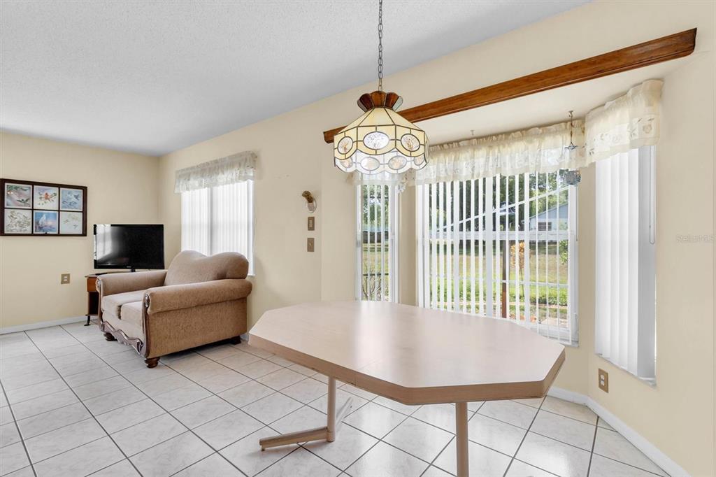 9058 Arundle Place New Port Richey, FL 34655 - Photo 13 of 59 a view of a livingroom with furniture and window