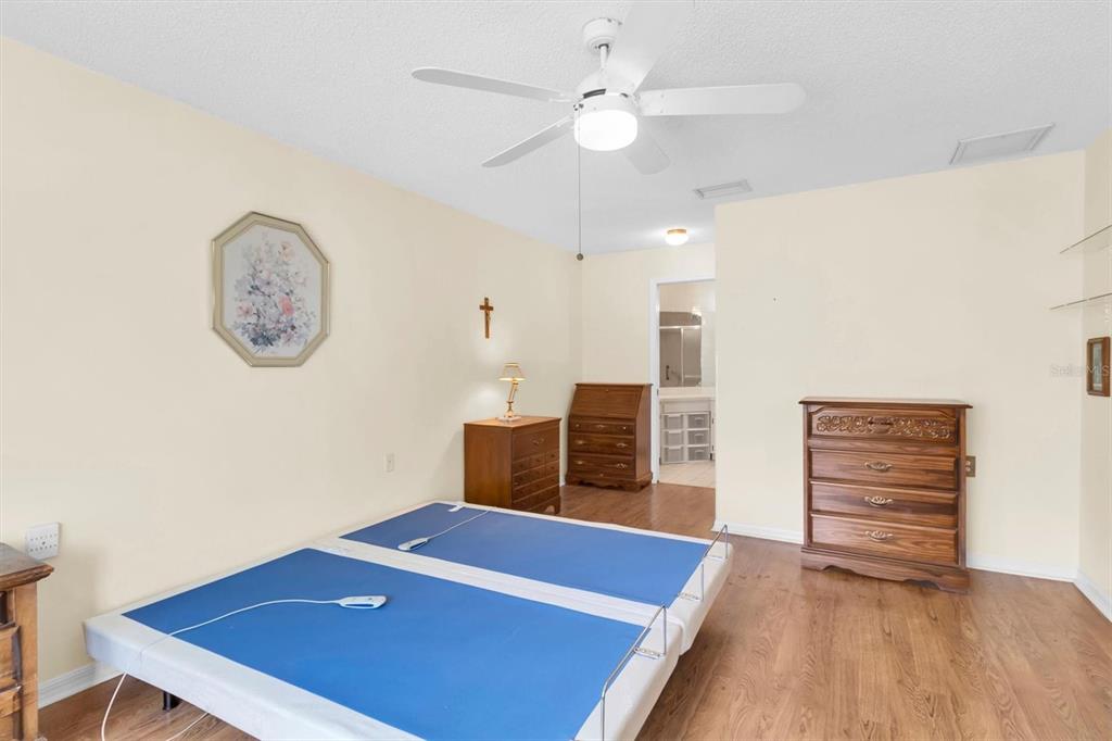 9058 Arundle Place New Port Richey, FL 34655 - Photo 17 of 59 a view of a room with furniture and a ceiling fan