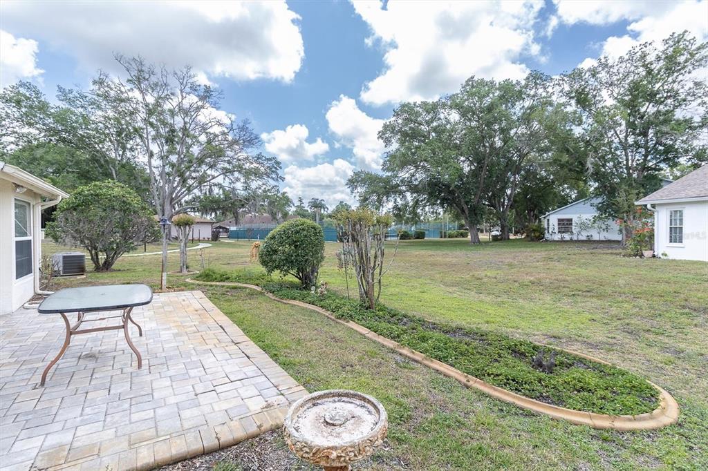 9058 Arundle Place New Port Richey, FL 34655 - Photo 28 of 59 a view of a backyard with sitting area