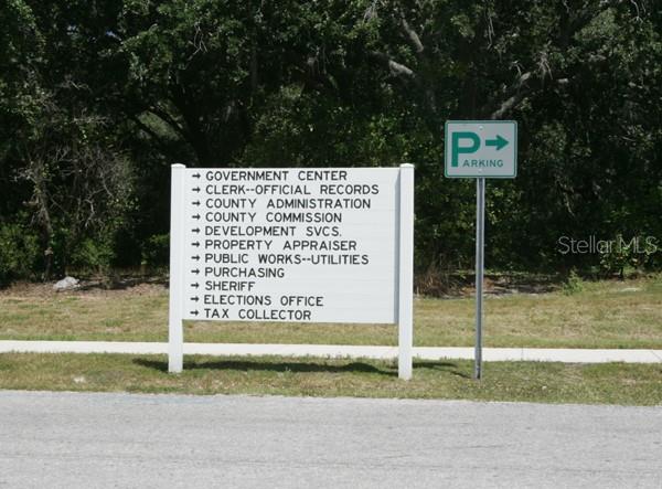 9058 Arundle Place New Port Richey, FL 34655 - Photo 55 of 59 a sign on the side of a road
