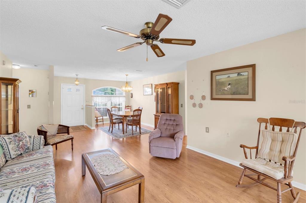 9058 Arundle Place New Port Richey, FL 34655 - Photo 6 of 59 a living room with furniture