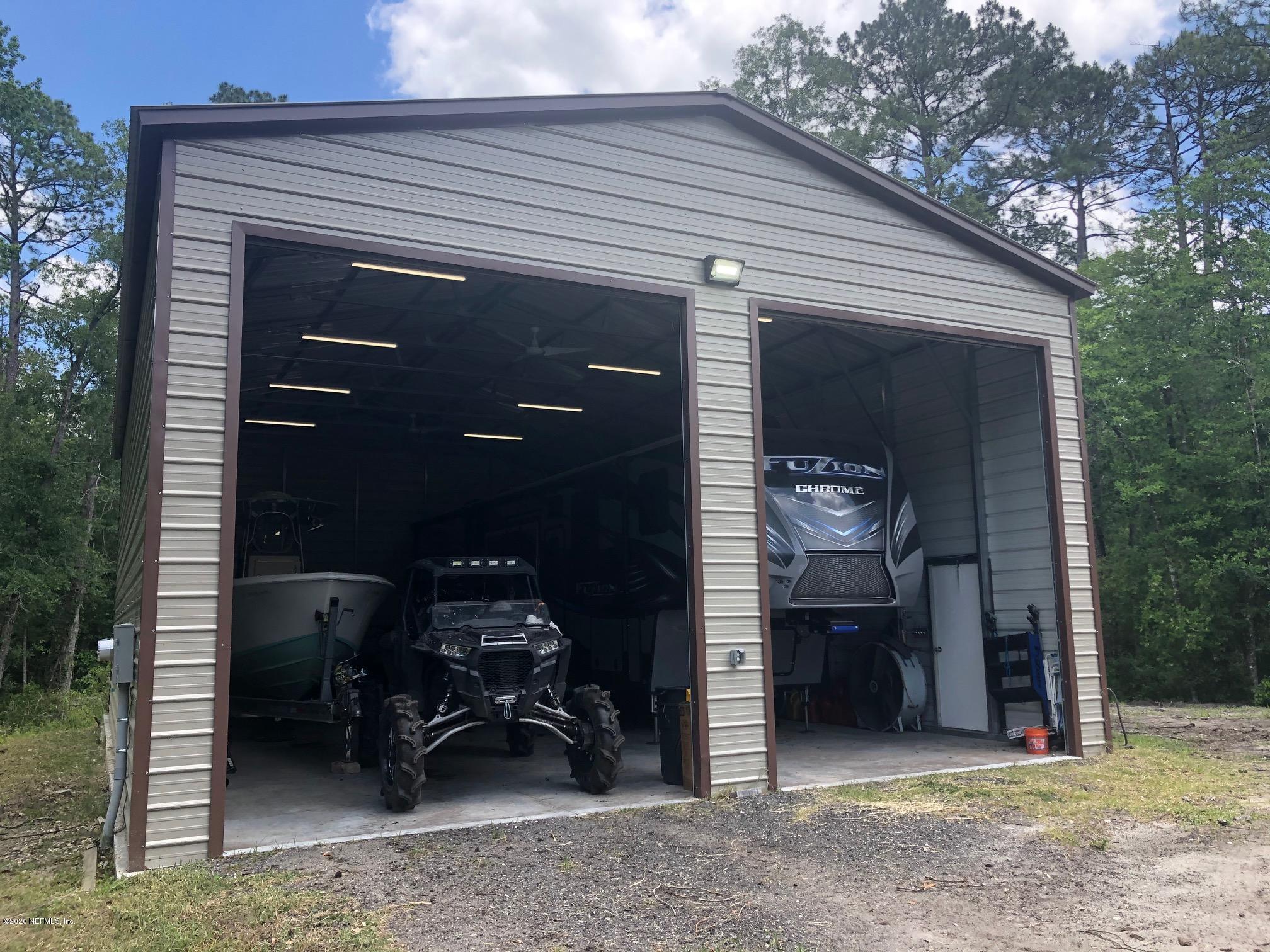 2853 Witch Hazel Road Middleburg, FL 32068 - Photo 46 of 46 Man Cave 14ft doors