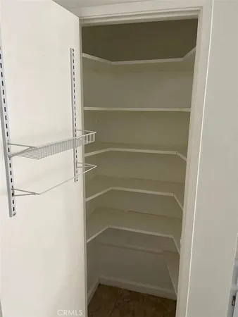 a empty closet with white paint