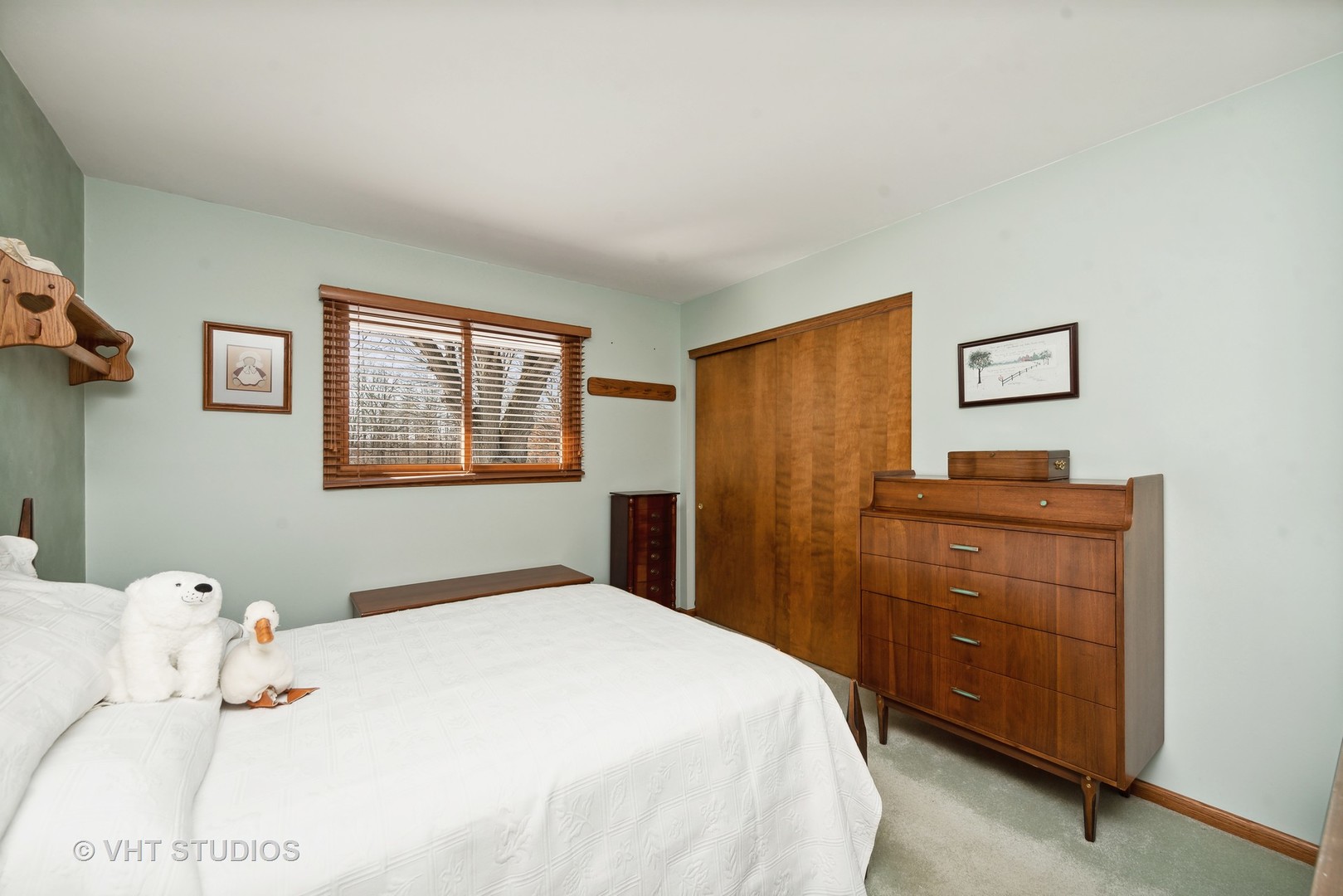 28046 Brandenburg Road Ingleside, IL 60041 - Photo 12 of 17 a bedroom with a bed and a dresser in it