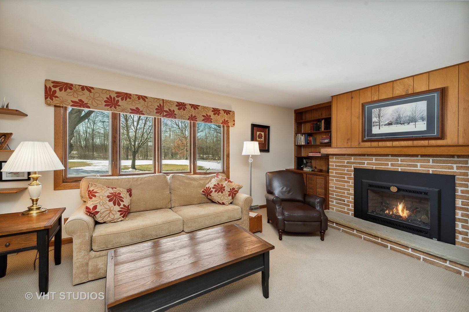 28046 Brandenburg Road Ingleside, IL 60041 - Photo 4 of 17 a living room with furniture and a fireplace