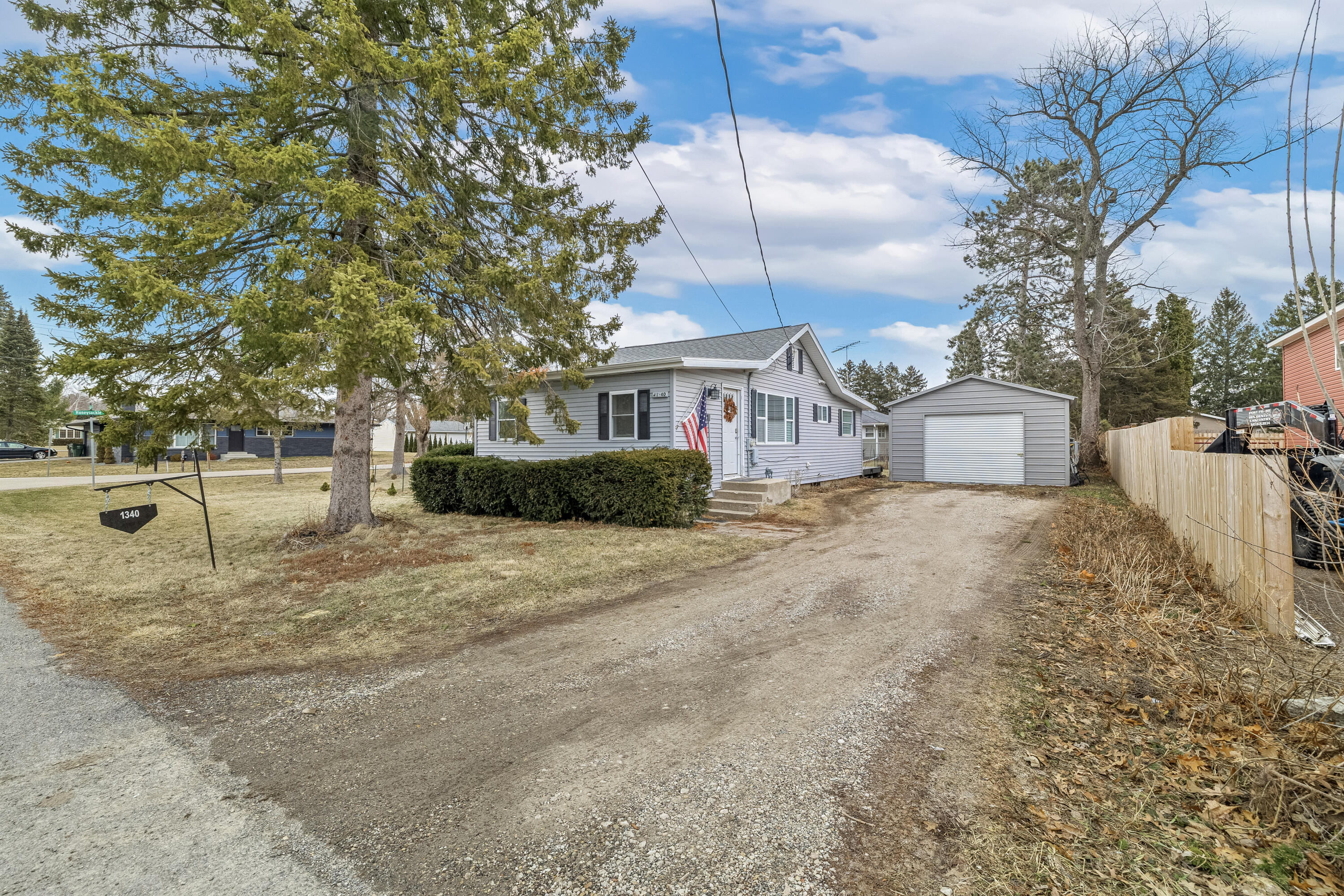N1340 Cedar Road Bloomfield, WI 53128 - Photo 10 of 14 One car garage and a long driveway