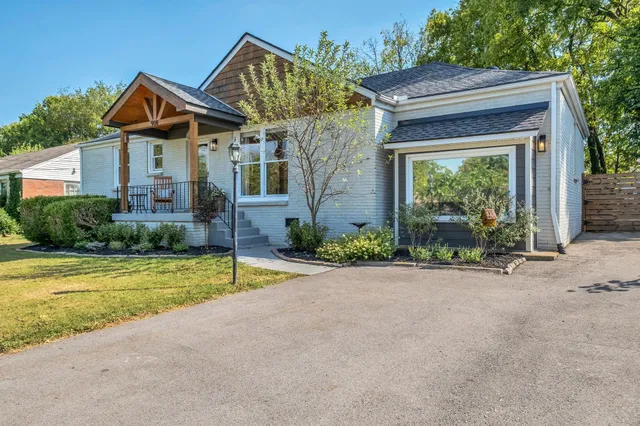 a front view of a house with porch