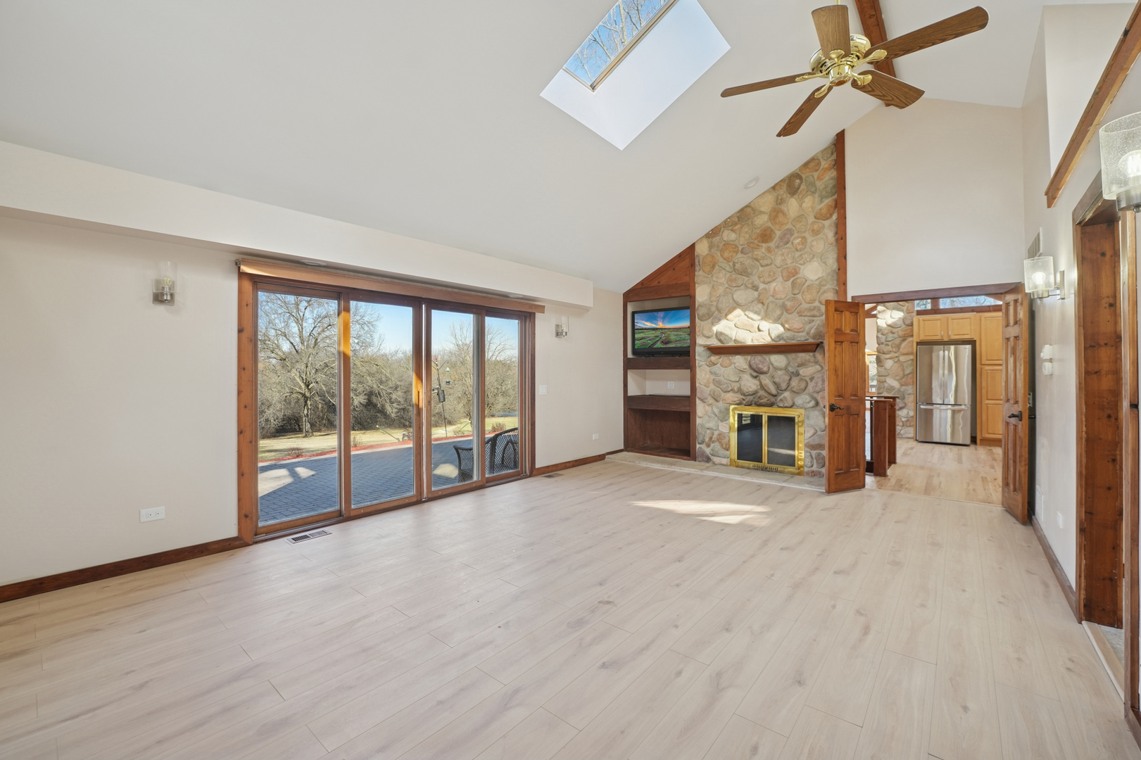 120 Old Barrington Road North Barrington, IL 60010 - Photo 13 of 31 a view of an empty room with a fireplace and a window