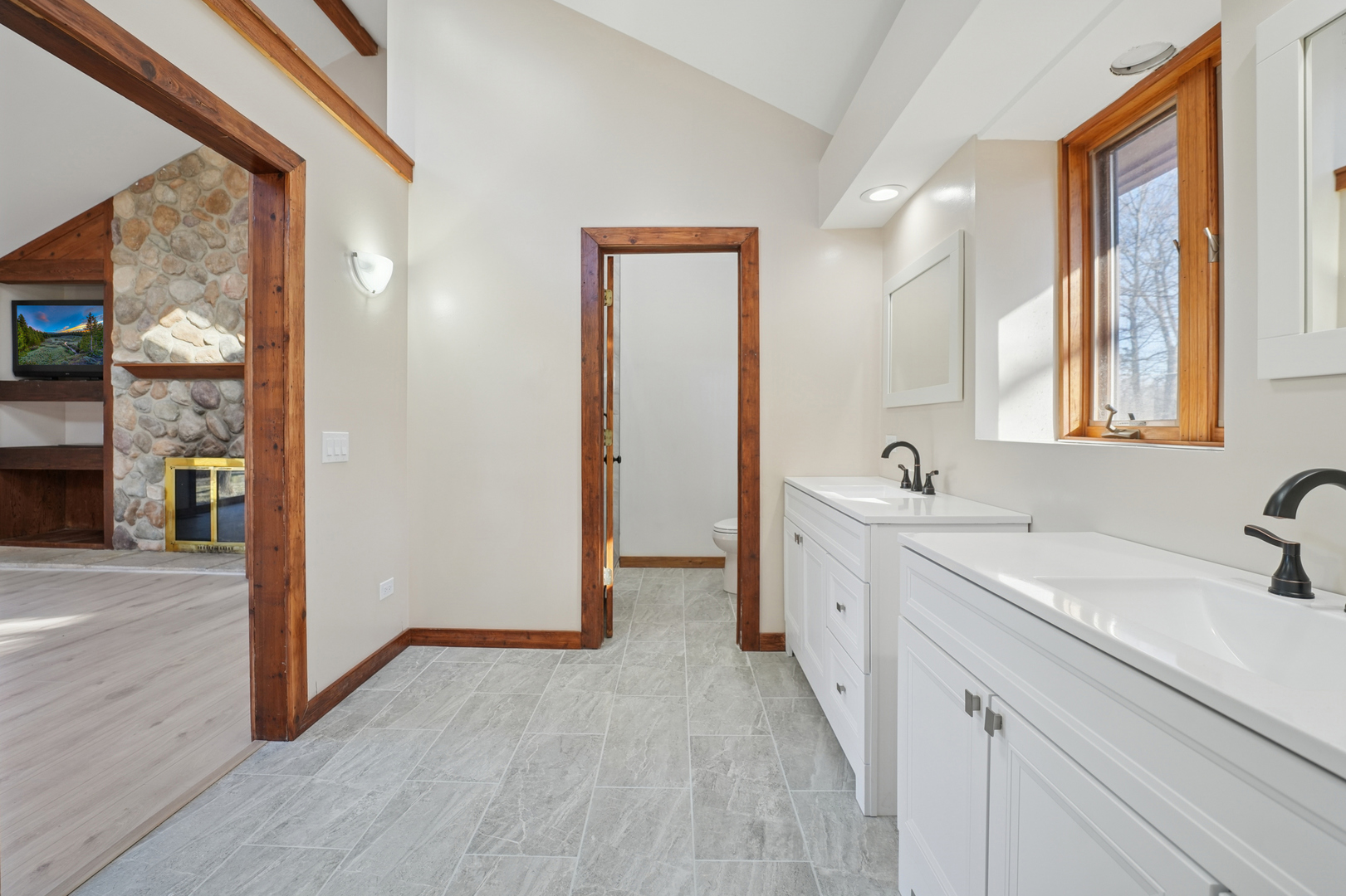 120 Old Barrington Road North Barrington, IL 60010 - Photo 18 of 31 a spacious bathroom with a double vanity sink a mirror and a shower