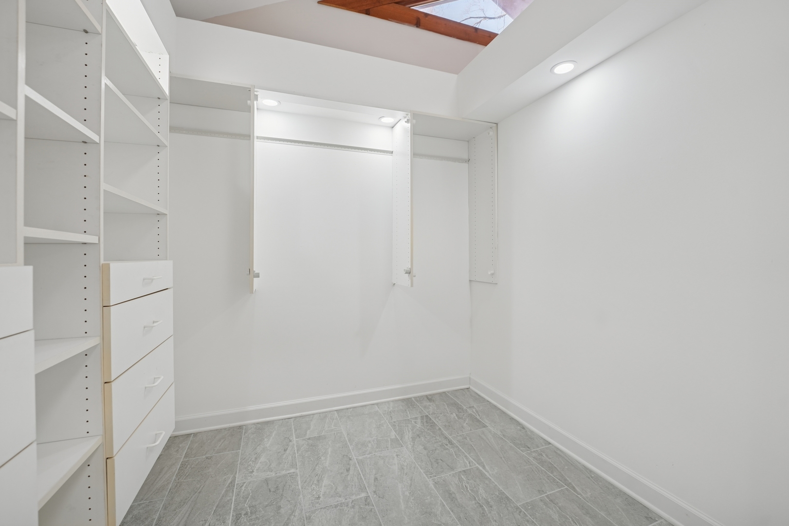 120 Old Barrington Road North Barrington, IL 60010 - Photo 19 of 31 a view of an empty walk in closet