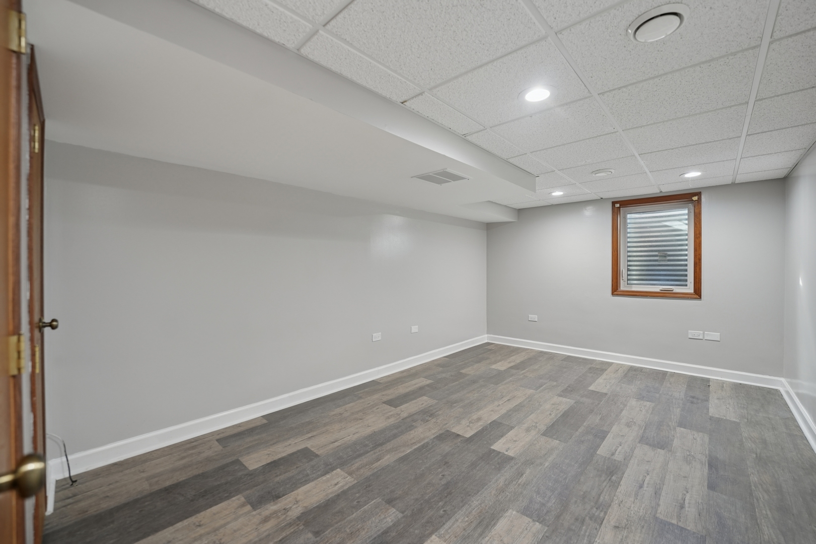 120 Old Barrington Road North Barrington, IL 60010 - Photo 22 of 31 an empty room with wooden floor and windows