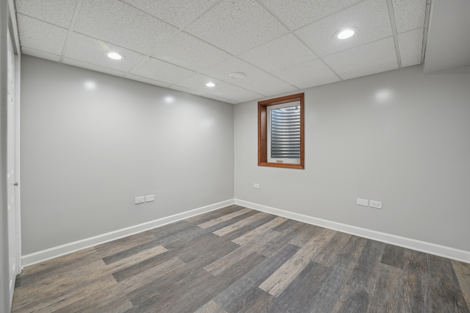 120 Old Barrington Road North Barrington, IL 60010 - Photo 24 of 31 an empty room with wooden floor and windows
