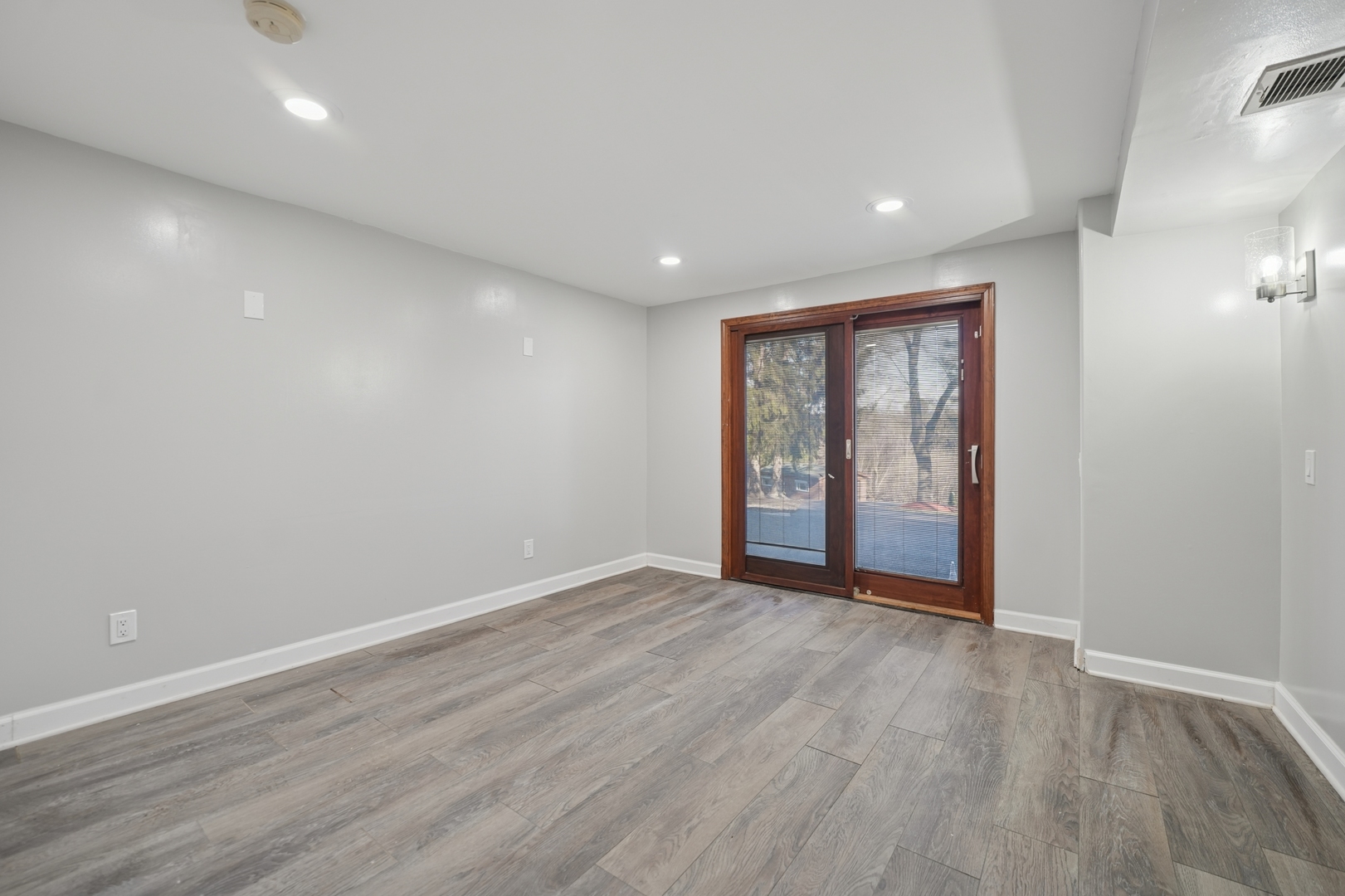 120 Old Barrington Road North Barrington, IL 60010 - Photo 25 of 31 a view of an empty room with wooden floor and a window