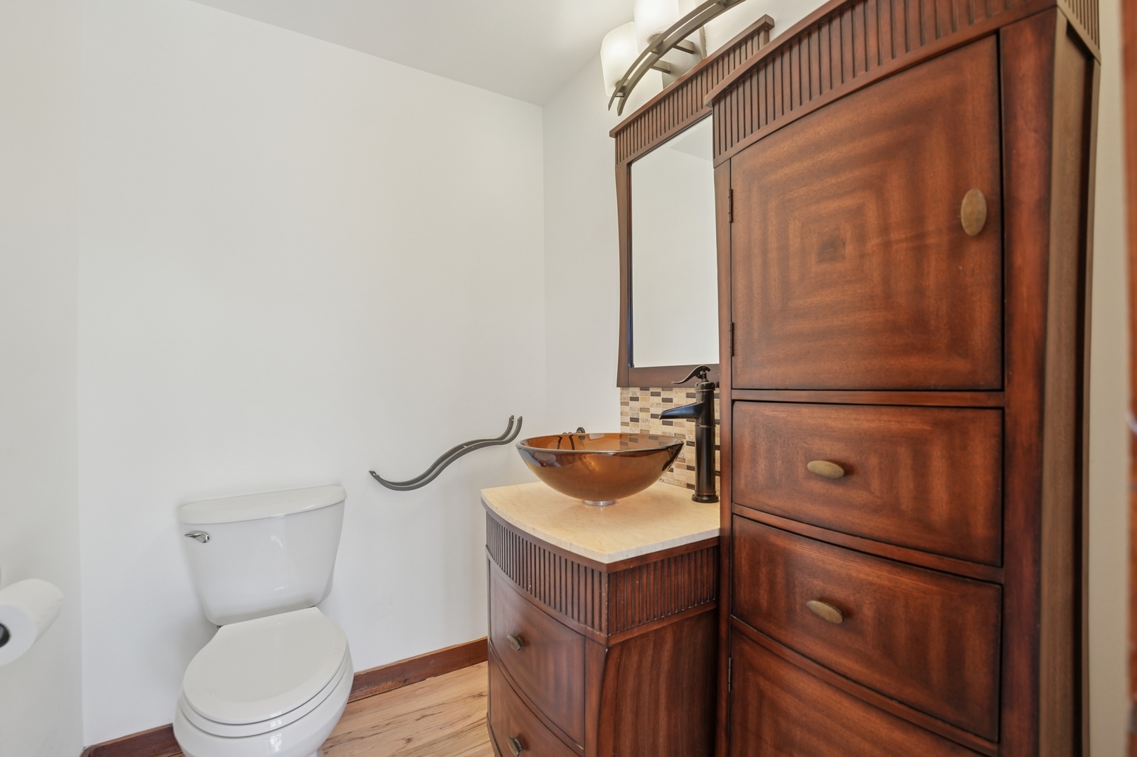 120 Old Barrington Road North Barrington, IL 60010 - Photo 8 of 31 a bathroom with a sink a toilet and shower