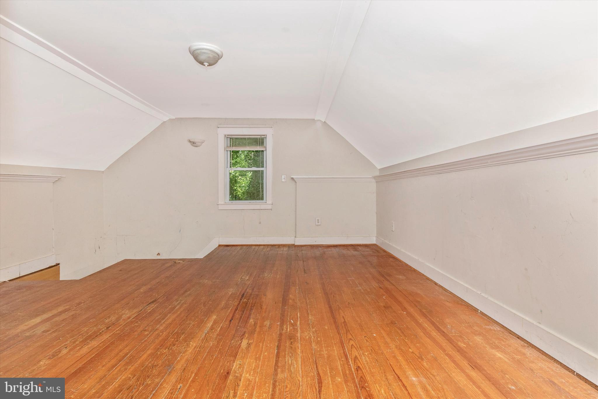 6300 Old Bohn Road Mount Airy, MD 21771 - Photo 36 of 45 an empty room with wooden floor and windows