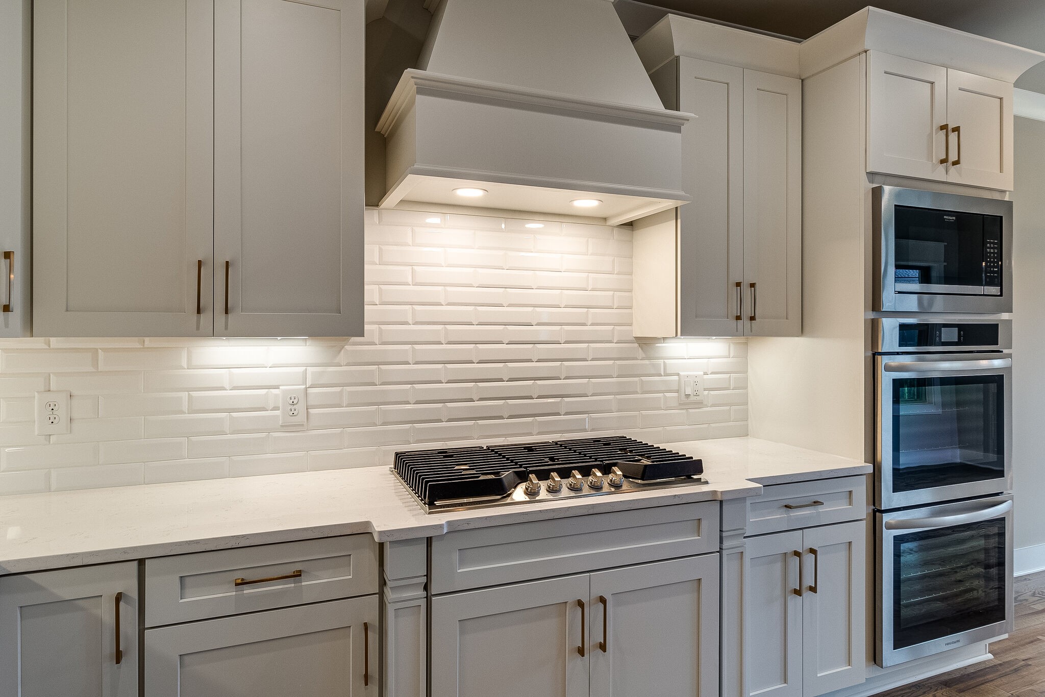1028 Gadwall Lane Spring Hill, TN 37174 - Photo 15 of 40 a kitchen with white cabinets and appliances