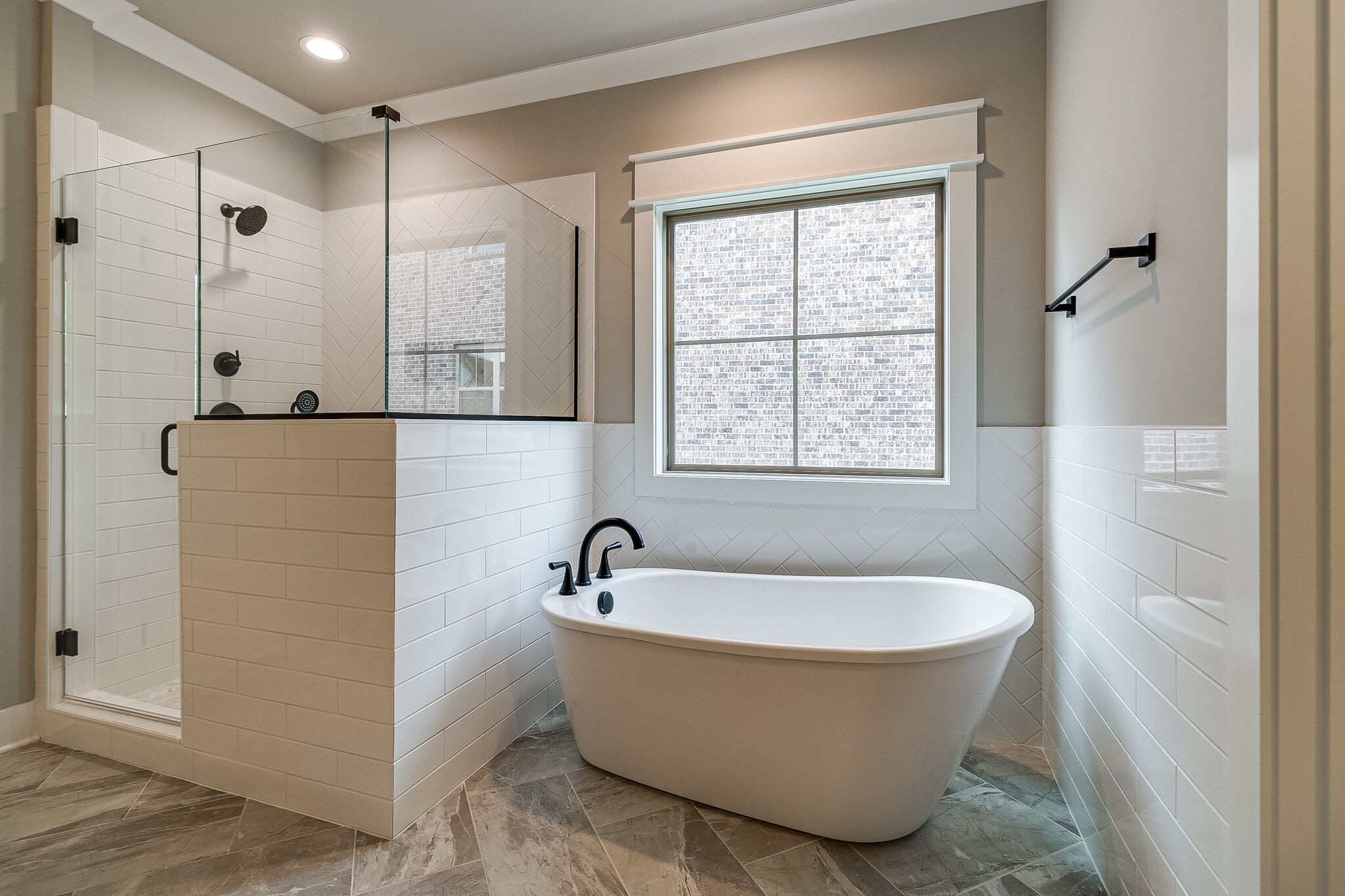 1028 Gadwall Lane Spring Hill, TN 37174 - Photo 23 of 40 a white bath tub sitting next to a shower