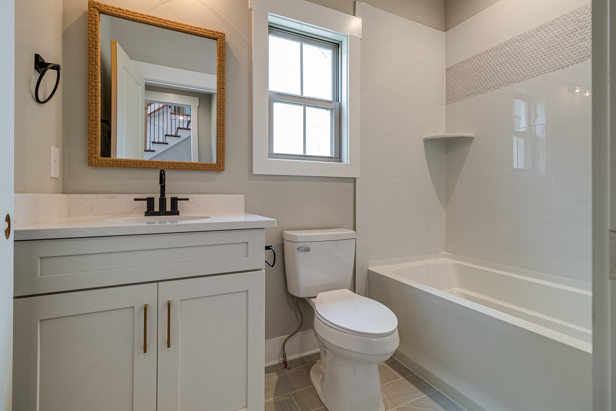 1028 Gadwall Lane Spring Hill, TN 37174 - Photo 28 of 40 a bathroom with a sink toilet and vanity