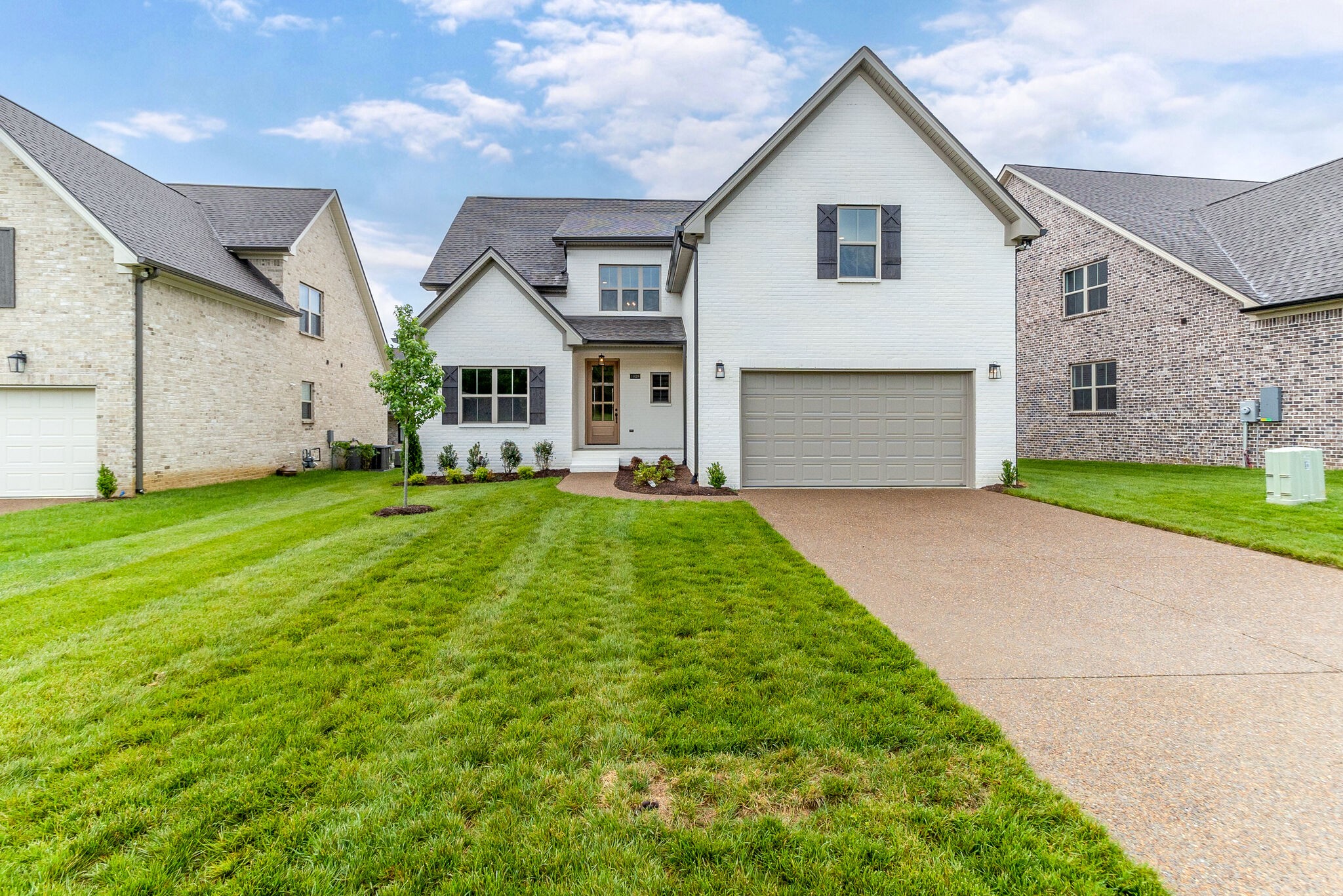 1028 Gadwall Lane Spring Hill, TN 37174 - Photo 3 of 40 a front view of house with yard and green space