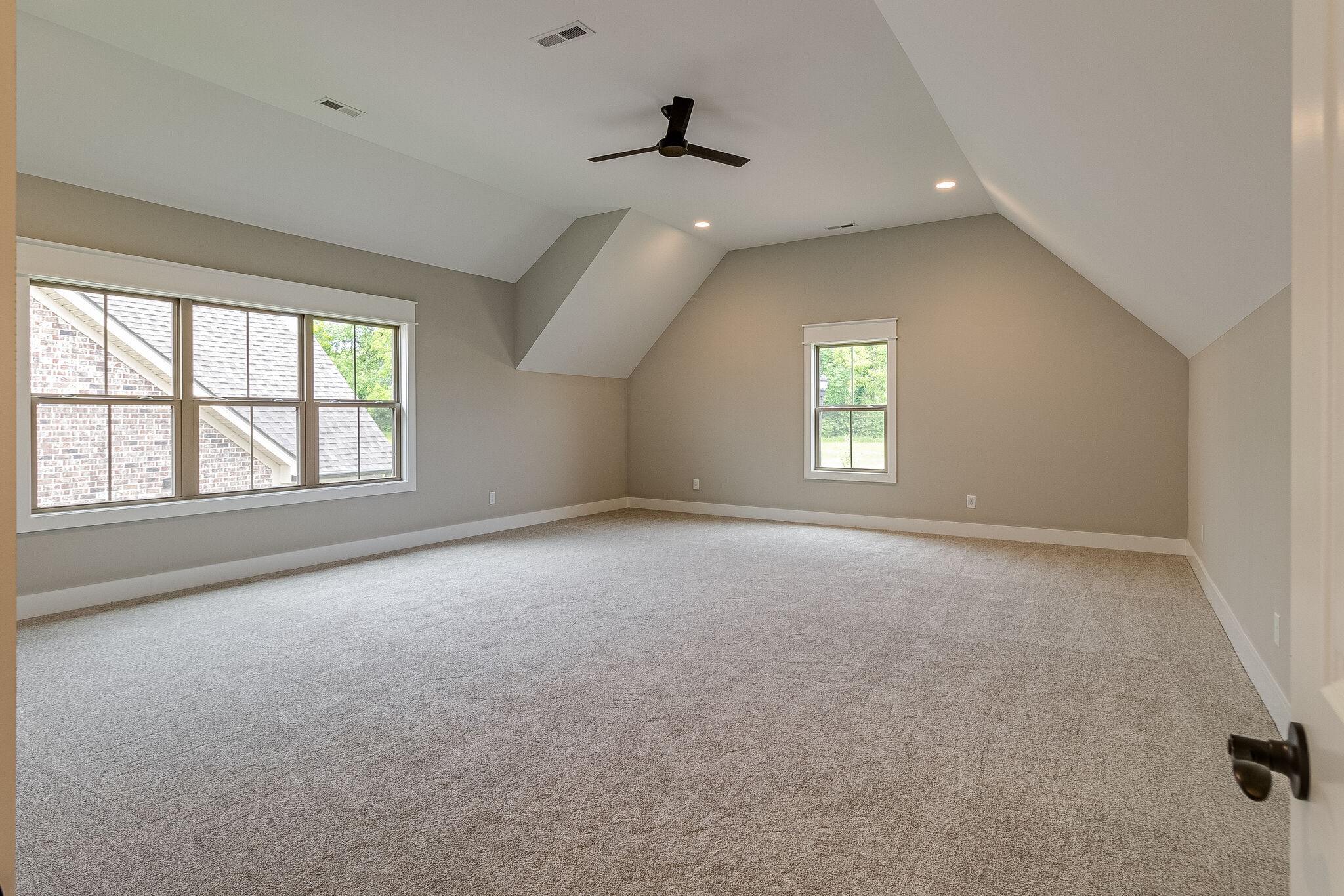 1028 Gadwall Lane Spring Hill, TN 37174 - Photo 35 of 40 an empty room with windows and ceiling fan
