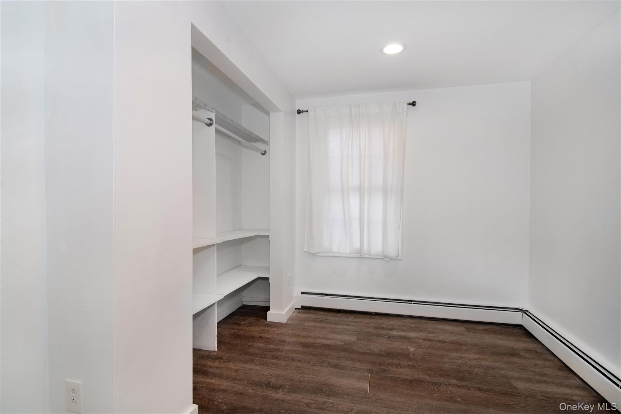 44 Ridge Street, Unit 1 Hastings-on-Hudson, NY 10706 - Photo 7 of 16 Bedroom View 1and dark hardwood / wood-style flooring