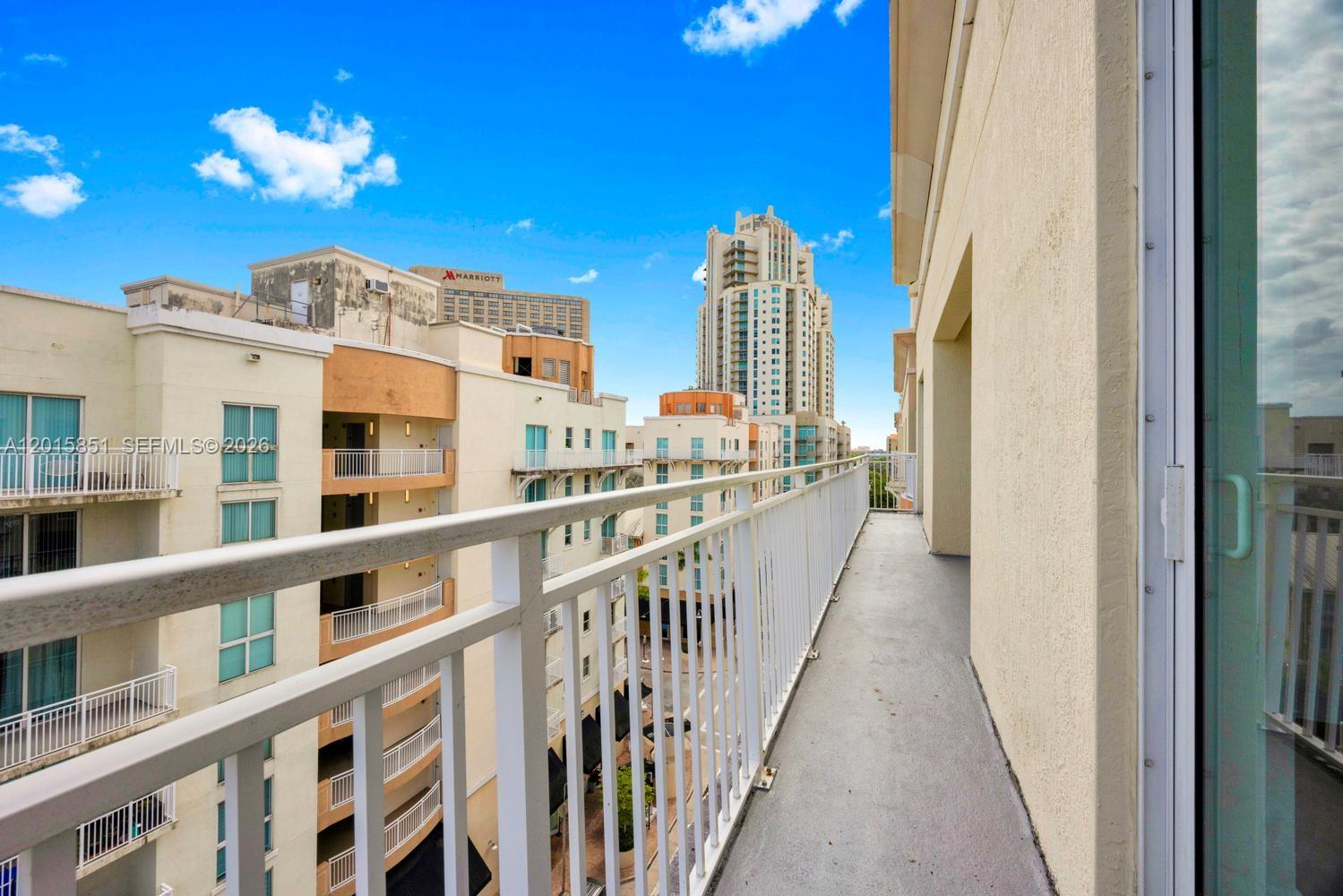 7275 Southwest 90th Street, Unit C719 Miami, FL 33156 - Photo 21 of 25 a view of a balcony with city view