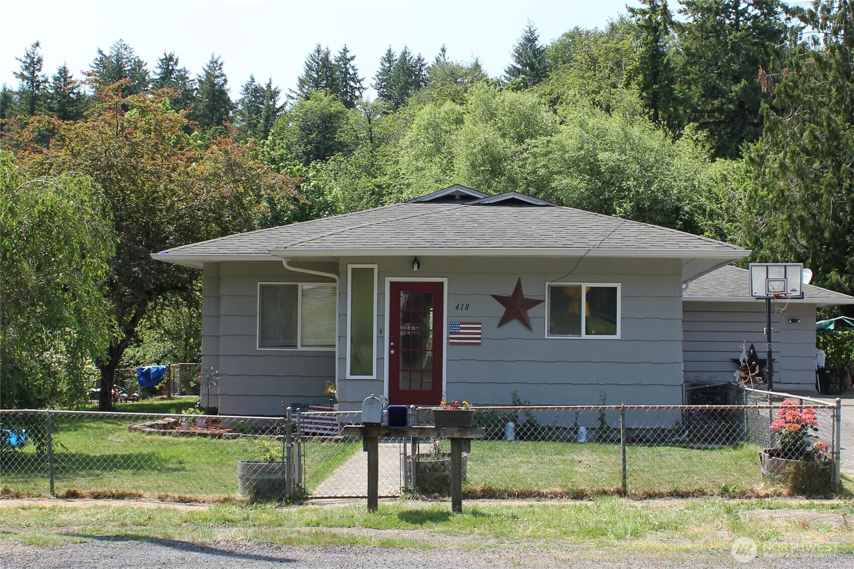 front view of a house with a yard