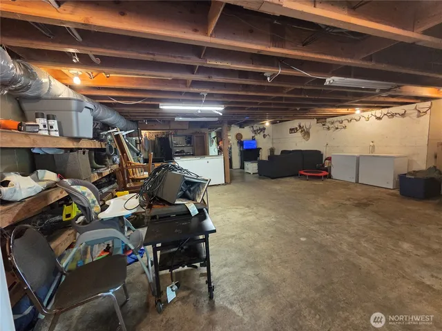 a view of a room with wooden walls