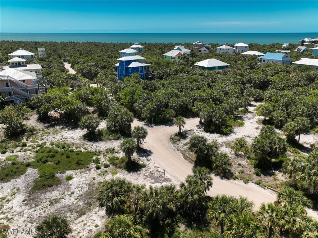 671 Rum Road Upper Captiva, FL 33924 - Photo 20 of 20 a view of a lake with a city