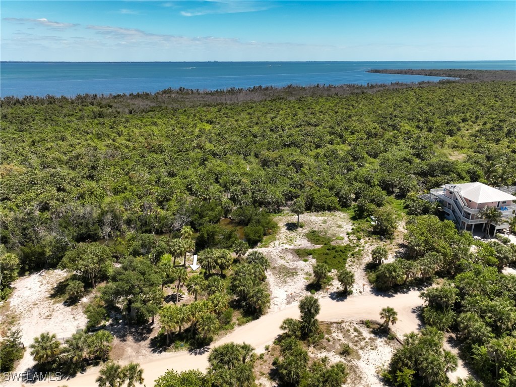 671 Rum Road Upper Captiva, FL 33924 - Photo 7 of 20 a view of a room with a lake