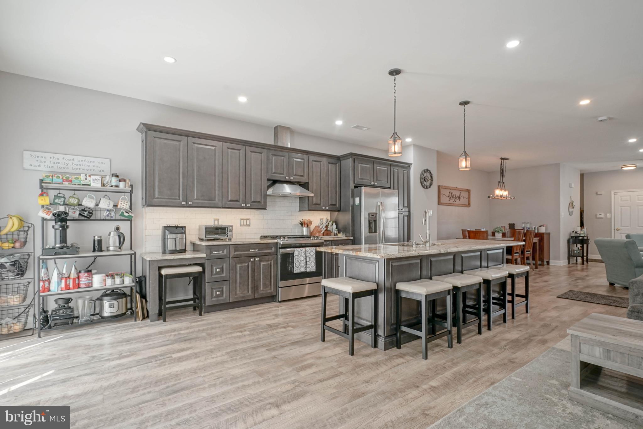 4 Compass Circle Mount Laurel, NJ 08054 - Photo 11 of 48 a large kitchen with a table and chairs
