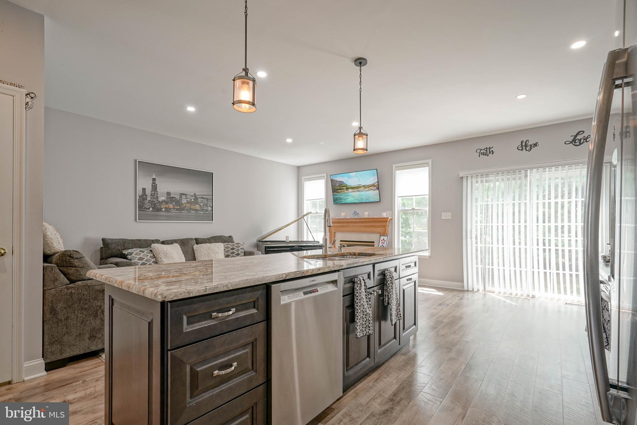 4 Compass Circle Mount Laurel, NJ 08054 - Photo 13 of 48 a kitchen with a stove a sink a counter space and a window