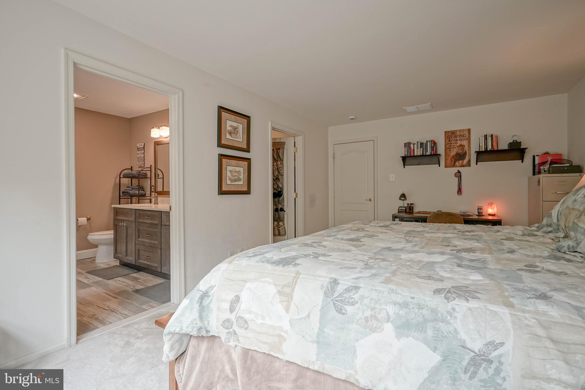 4 Compass Circle Mount Laurel, NJ 08054 - Photo 29 of 48 a spacious bedroom with a bed and a view of kitchen