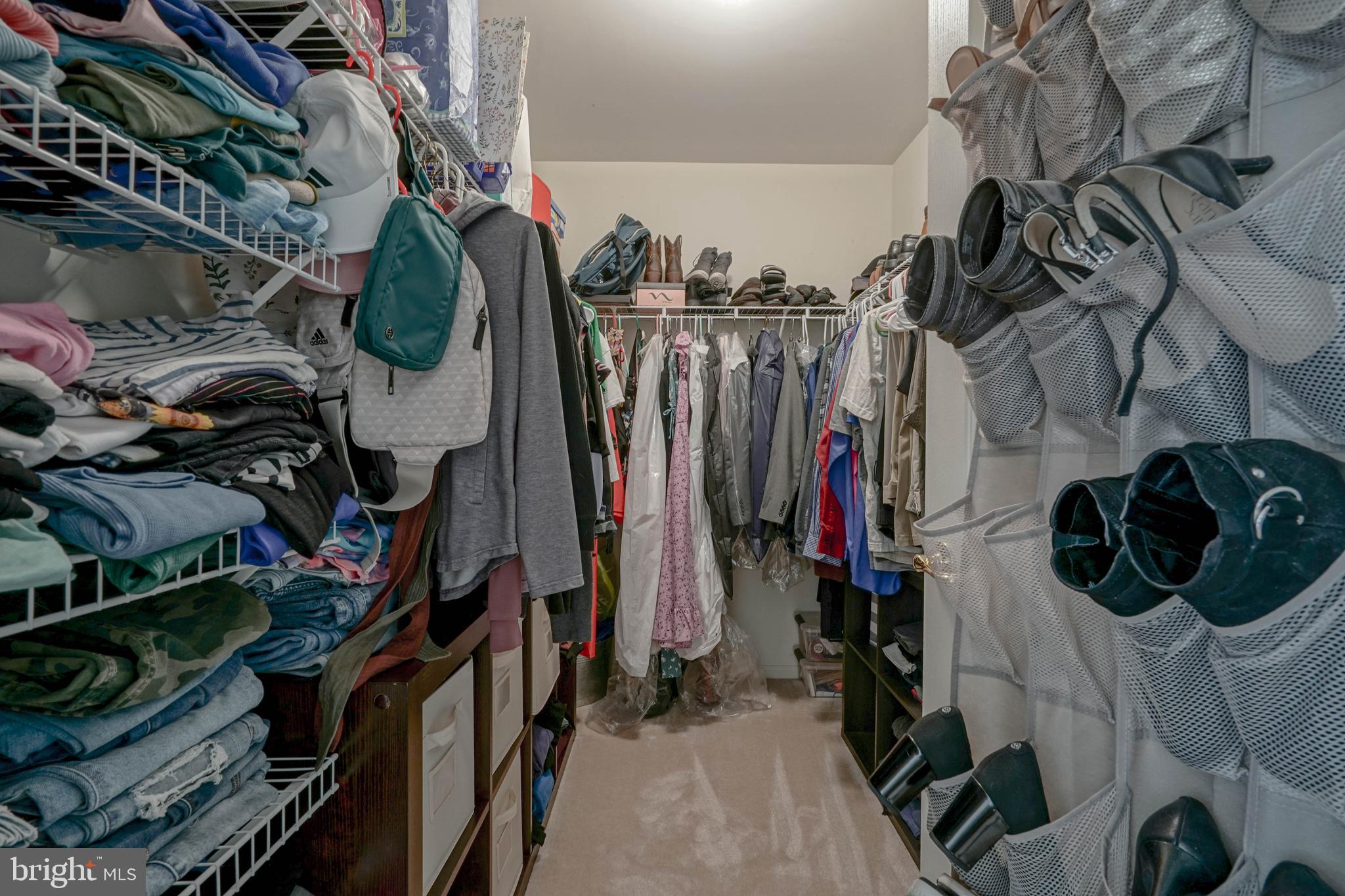 4 Compass Circle Mount Laurel, NJ 08054 - Photo 31 of 48 a view of walk in closet with clothes and shoes