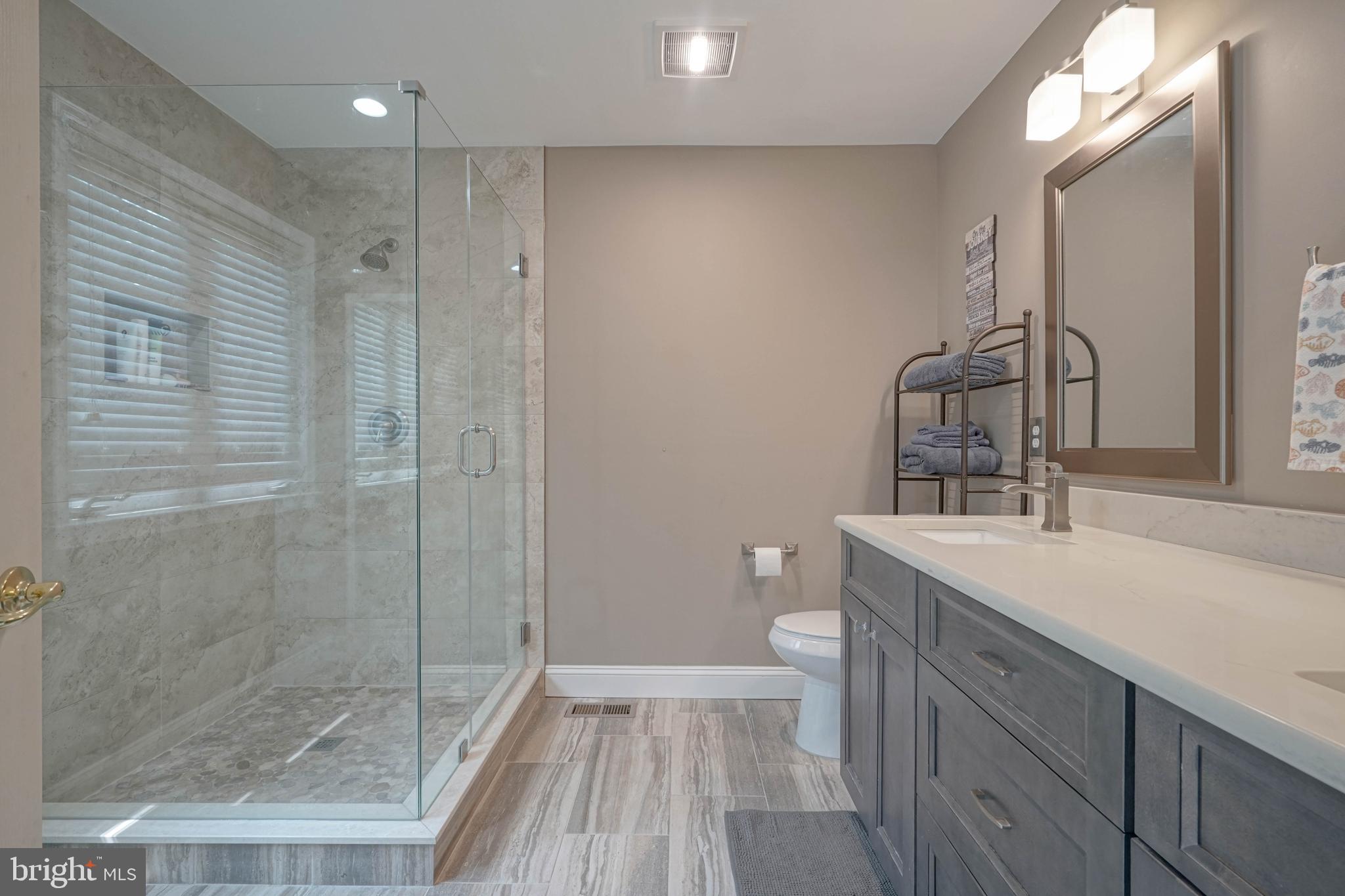 4 Compass Circle Mount Laurel, NJ 08054 - Photo 32 of 48 a bathroom with a sink a toilet and shower