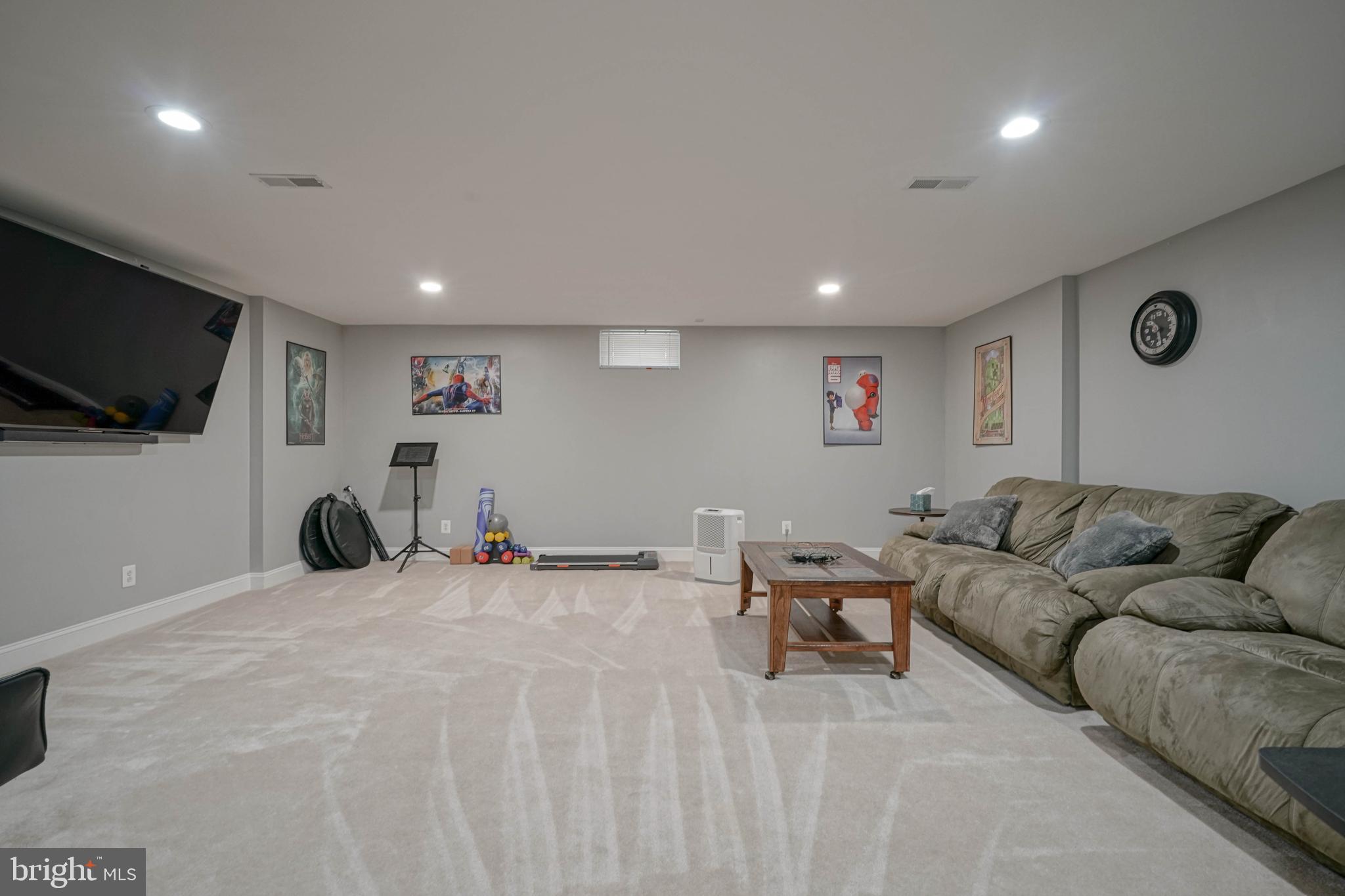 4 Compass Circle Mount Laurel, NJ 08054 - Photo 36 of 48 a living room with furniture and a flat screen tv