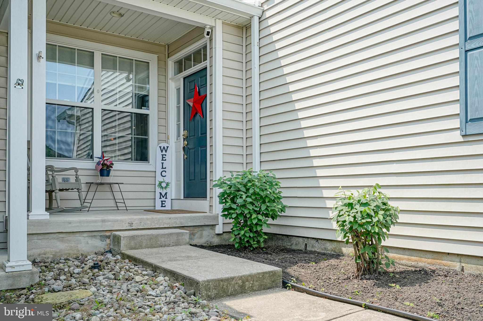 4 Compass Circle Mount Laurel, NJ 08054 - Photo 5 of 48 a view of a house with potted plants