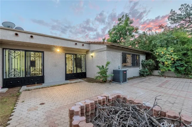 a view of a house with a patio