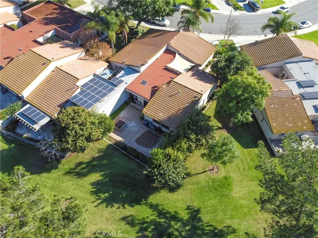 an aerial view of residential house with outdoor space