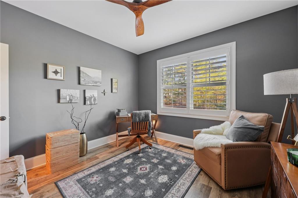 602 Red Leaf Way Canton, GA 30114 - Photo 14 of 40 a living room with furniture and a window