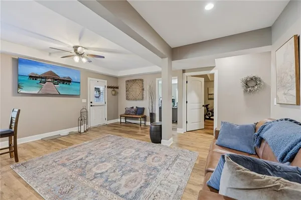 a living room with furniture and a rug