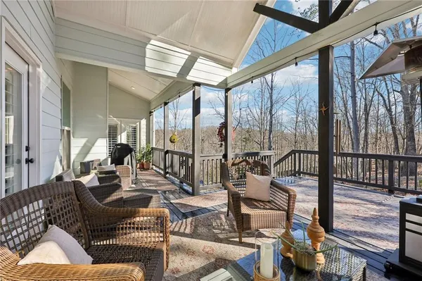 a living room with patio furniture