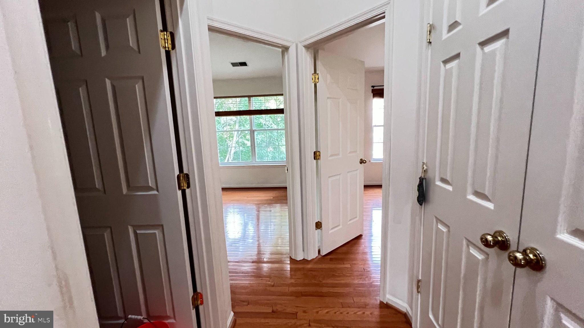 4100 Flower Fairfax, VA 22030 - Photo 19 of 47 a view of a hallway with wooden floor and staircase
