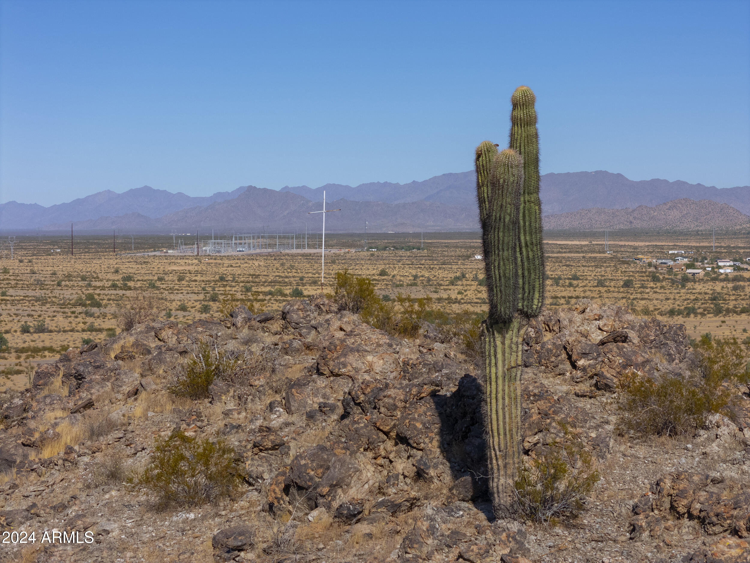 0 West Hilldale Road, Unit 7 Maricopa, AZ 85139 - Photo 15 of 24 a view of a lake with a mountain in the background