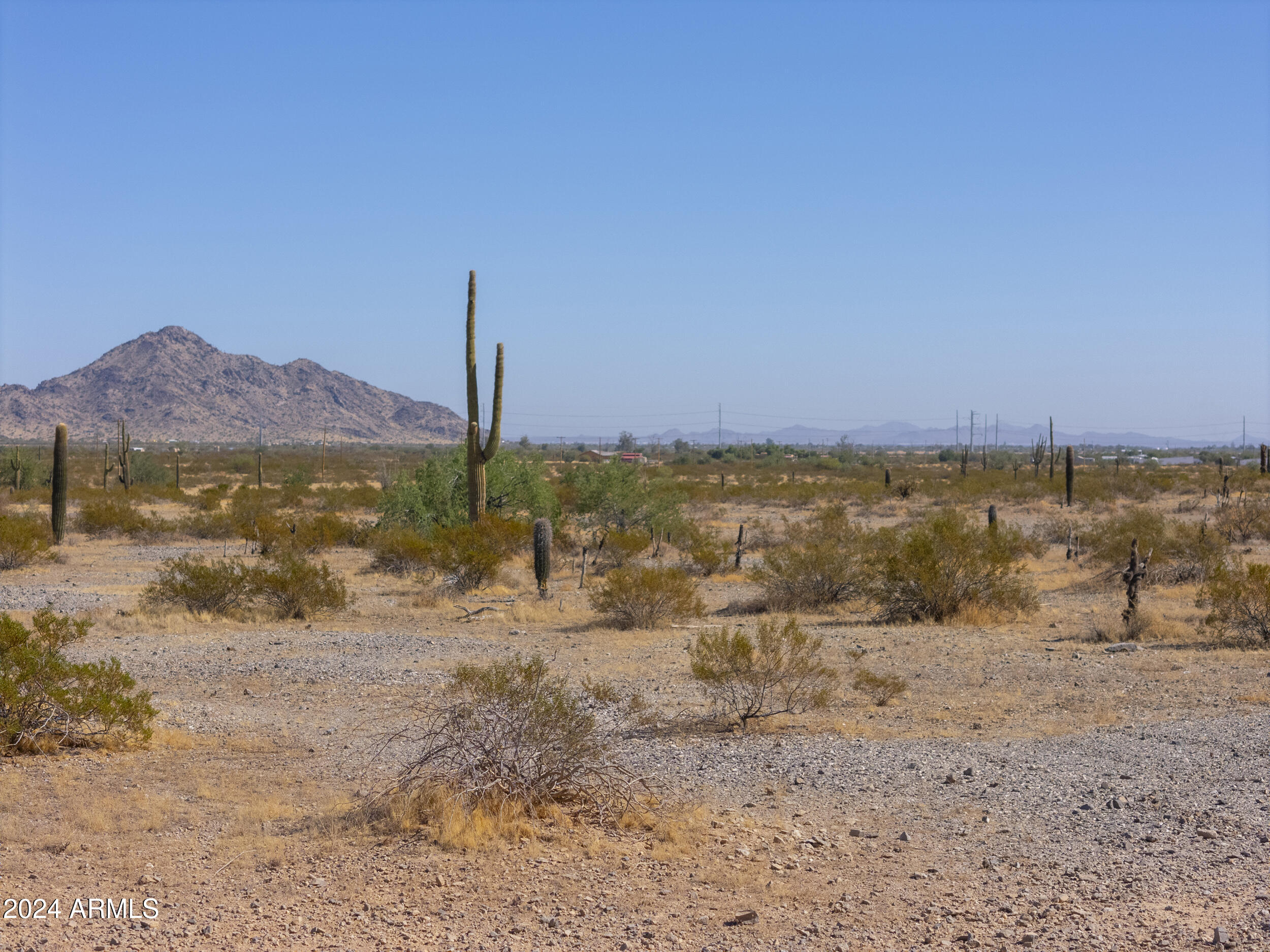 0 West Hilldale Road, Unit 7 Maricopa, AZ 85139 - Photo 23 of 24 a view of a road with an ocean beach