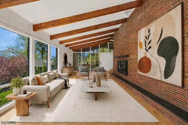 a view of balcony with wooden floor