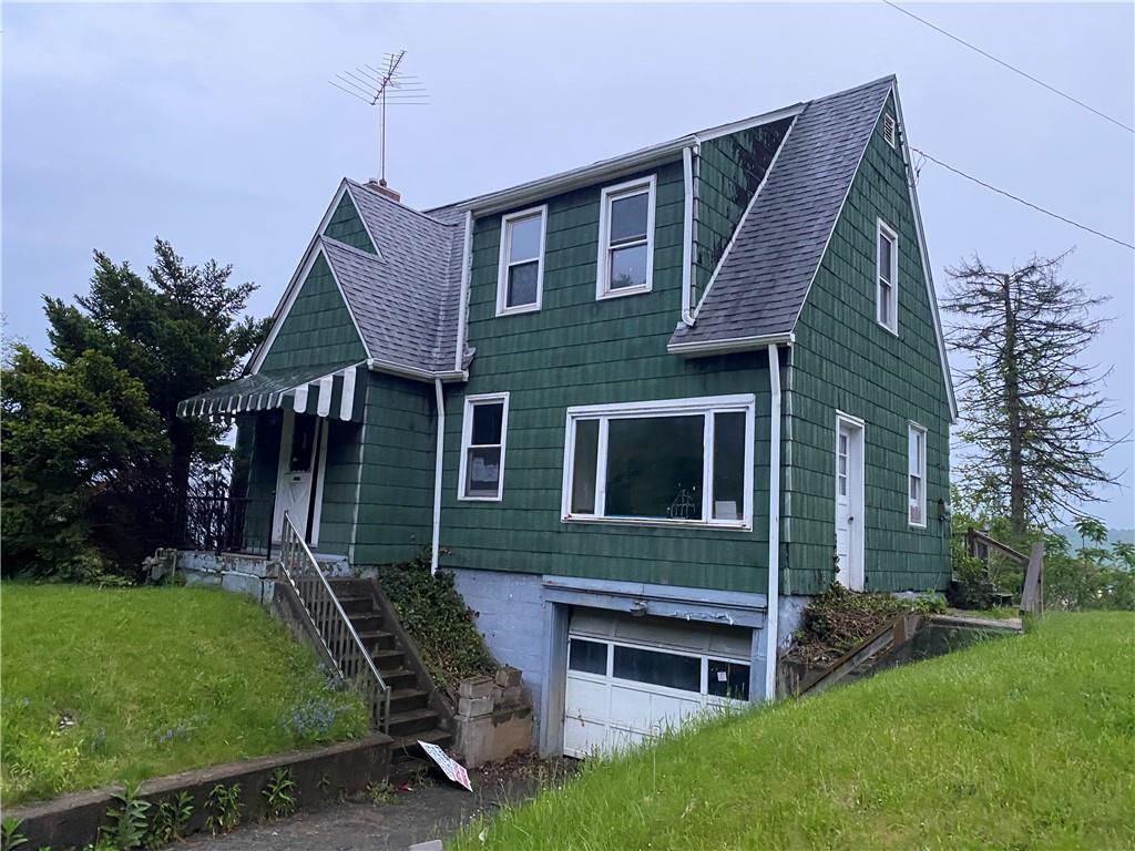 333 Freeport Road Freeport, PA 16229 - Photo 2 of 13 a front view of a house with a garden