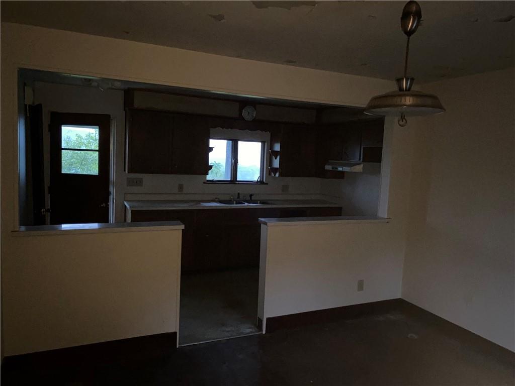 333 Freeport Road Freeport, PA 16229 - Photo 6 of 13 a kitchen with a sink and cabinets