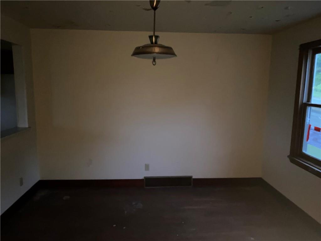 333 Freeport Road Freeport, PA 16229 - Photo 7 of 13 a view of a room with rack on the wall and a window